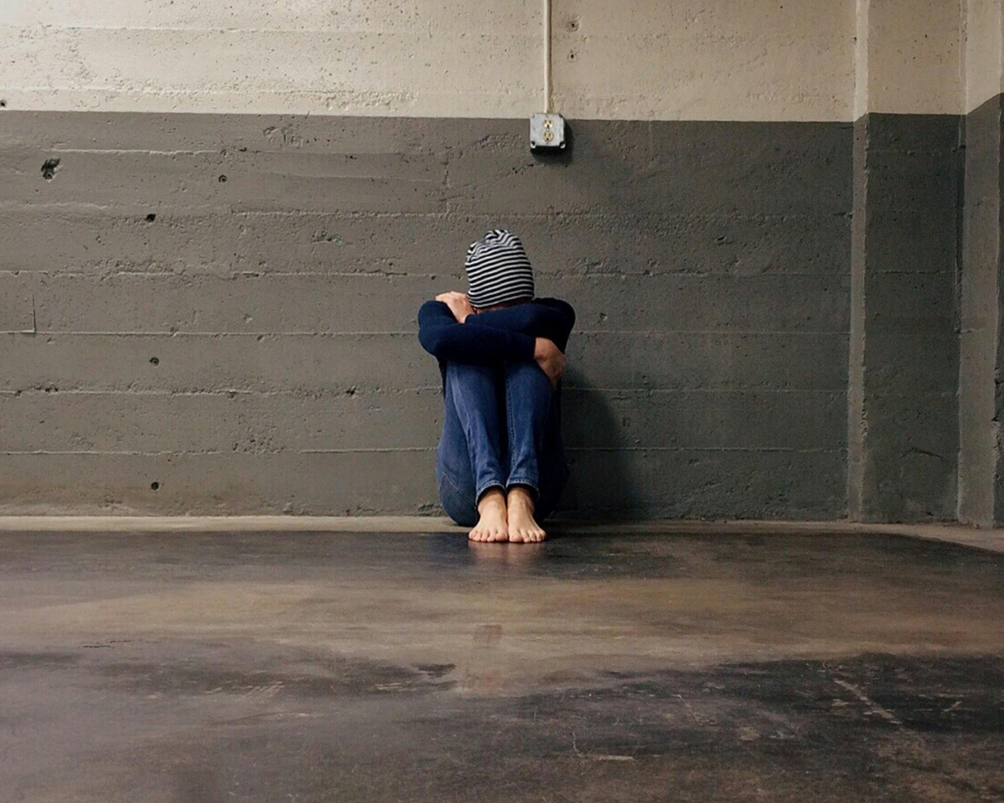 Young woman sitting alone